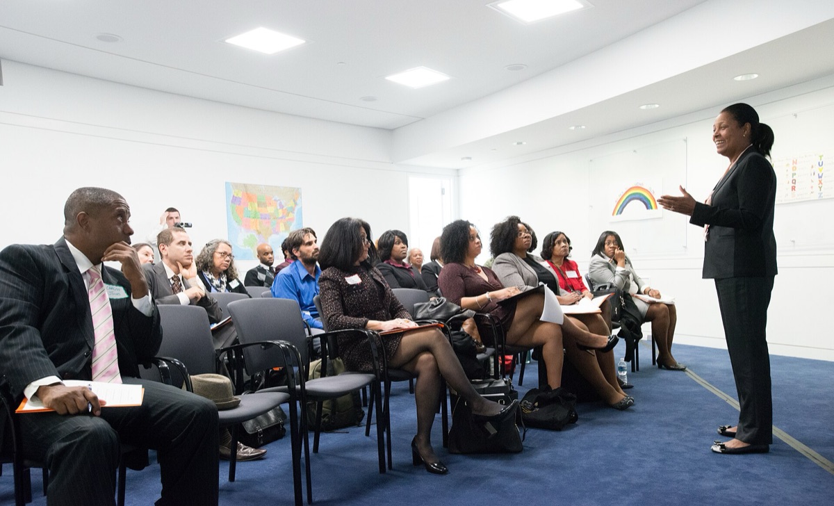 Close-up of a vibrant, focused group discussion on a digital screen
