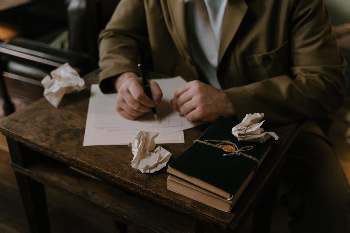 Leather journal with spilled ink representing documented journey