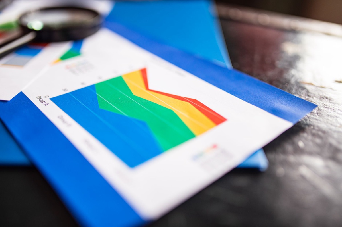 A tablet displaying a growth graph with organic spikes, emphasizing authenticity in strategy.
